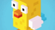 A pixel voxel chicken hopping across a busy three-lane highway in Crossy Road